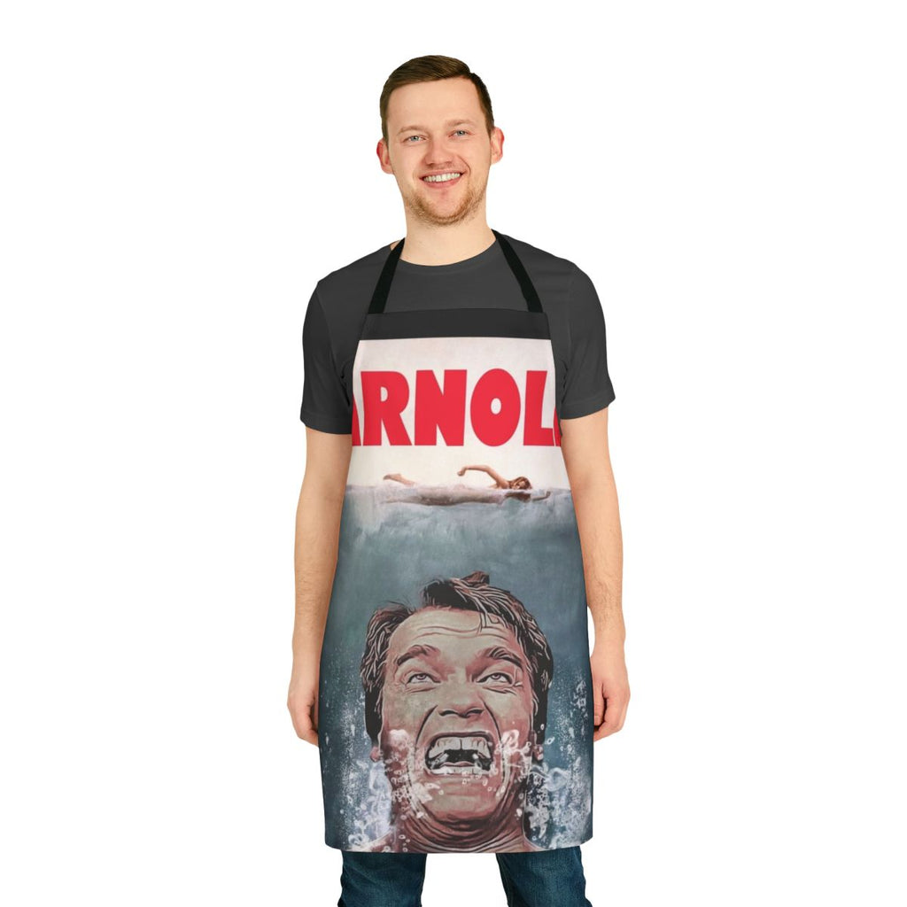 Photo of an apron featuring a parody design with Arnold Schwarzenegger and a shark