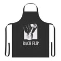 A creative apron design featuring a pun about the famous composer Johann Sebastian Bach.