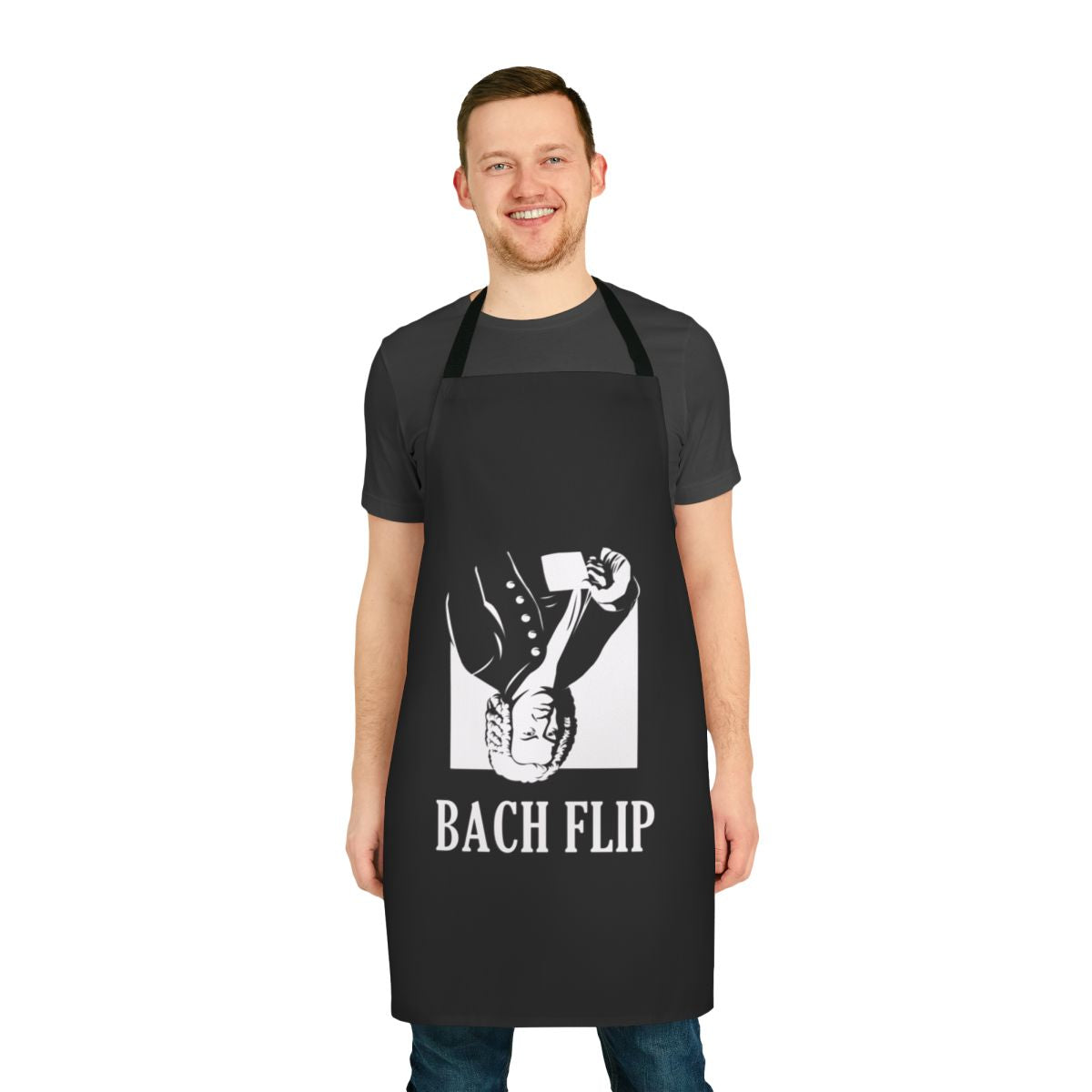 A creative apron design featuring a pun about the famous composer Johann Sebastian Bach.