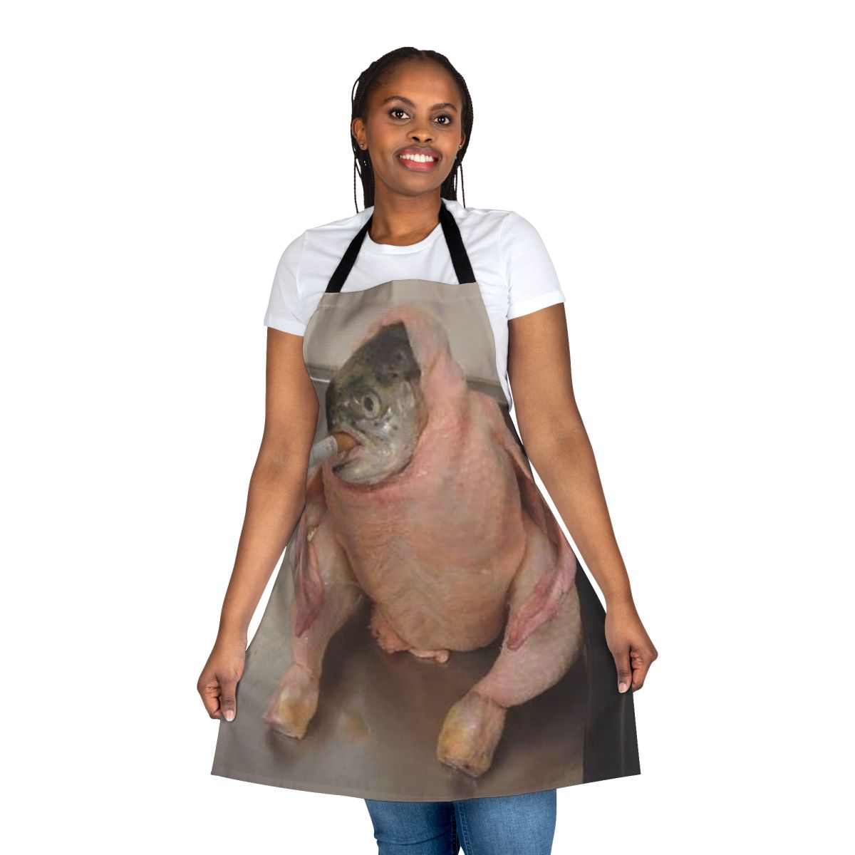 Person wearing a funny apron with a fish in a chicken design