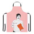 A photo of Oscar Isaac eating Cheetos with chopsticks, printed on a high-quality apron.