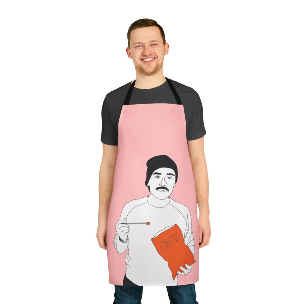 A photo of Oscar Isaac eating Cheetos with chopsticks, printed on a high-quality apron.