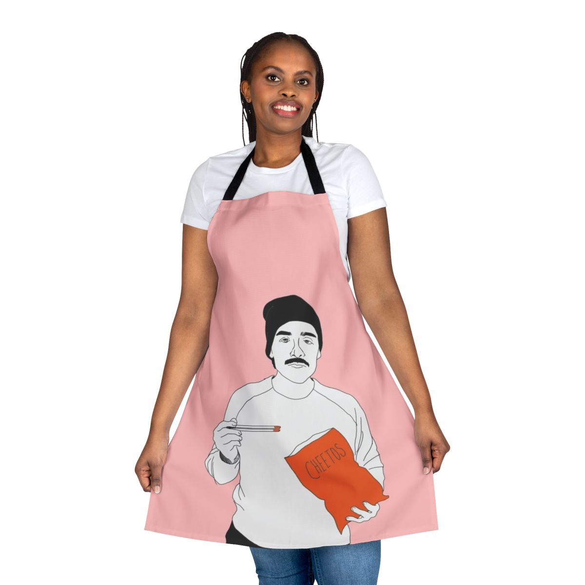 A photo of Oscar Isaac eating Cheetos with chopsticks, printed on a high-quality apron.