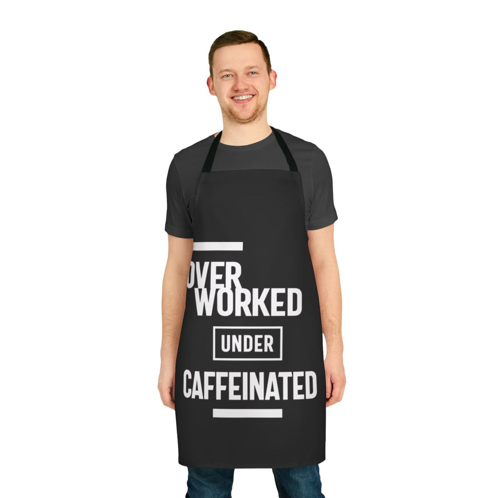 Image of a humorous apron with the text "Overworked Under Caffeinated"
