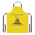 Person wearing a funny "That's My Purse" themed kitchen apron