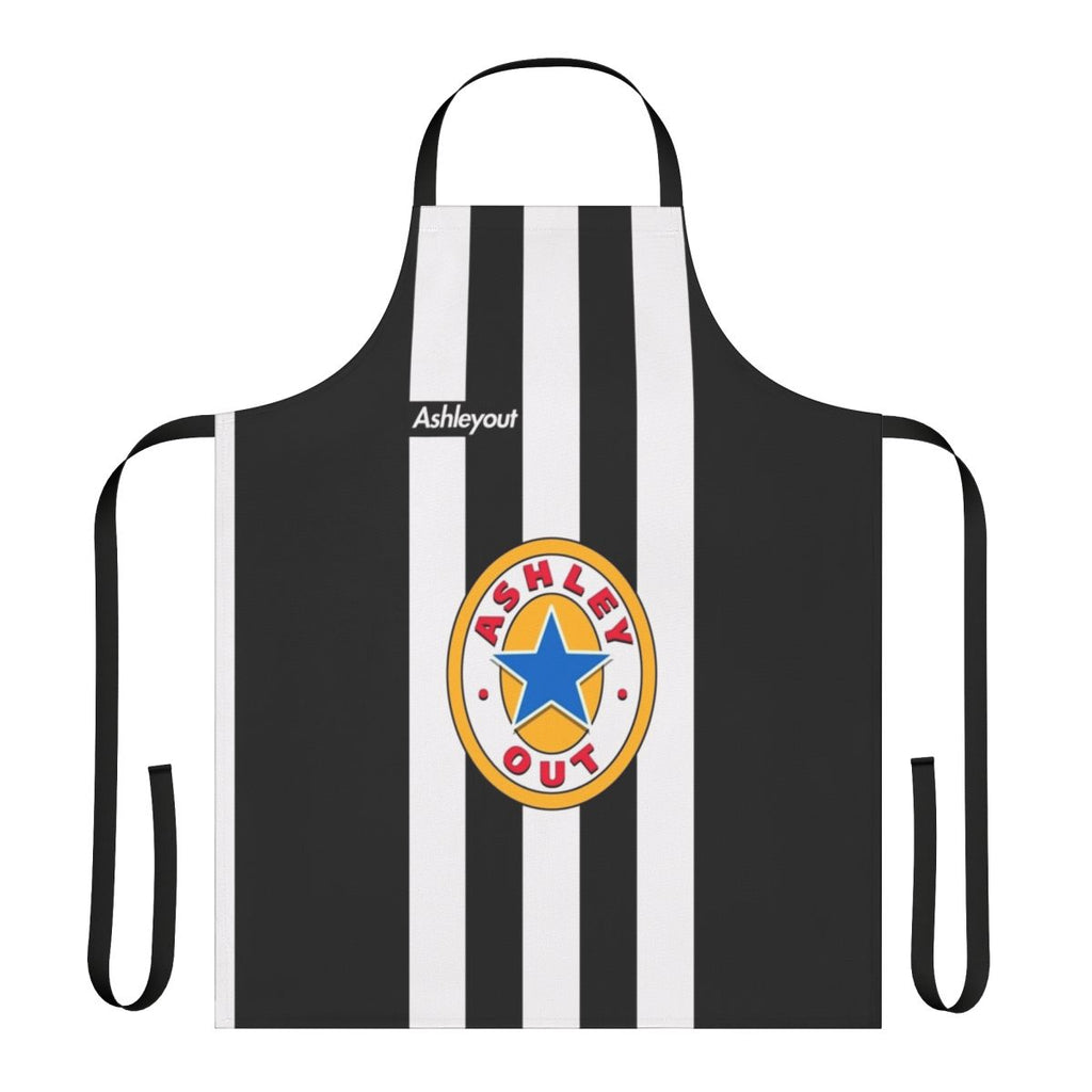 Stylized black and white apron with the text "AshleyOut" and the Newcastle United logo in yellow