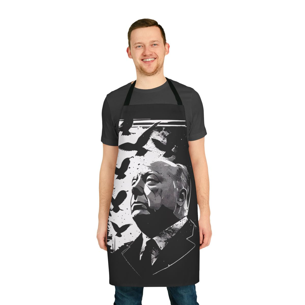 Apron featuring a stylized portrait of filmmaker Alfred Hitchcock, inspired by his classic film "The Birds"