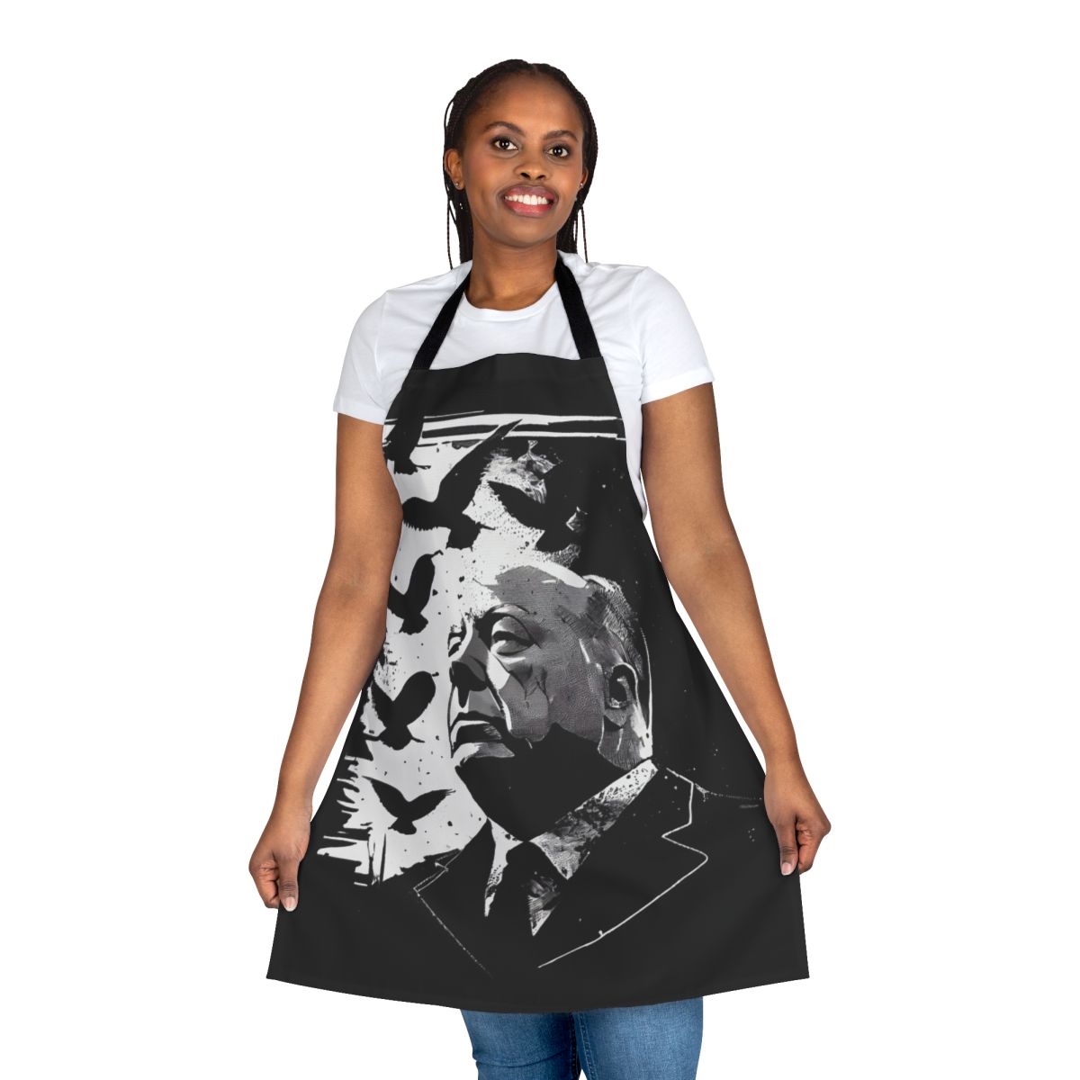 Apron featuring a stylized portrait of filmmaker Alfred Hitchcock, inspired by his classic film "The Birds"