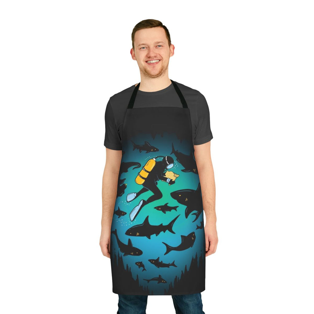 Colorful apron featuring an illustrated design of a shark and scuba diver underwater.