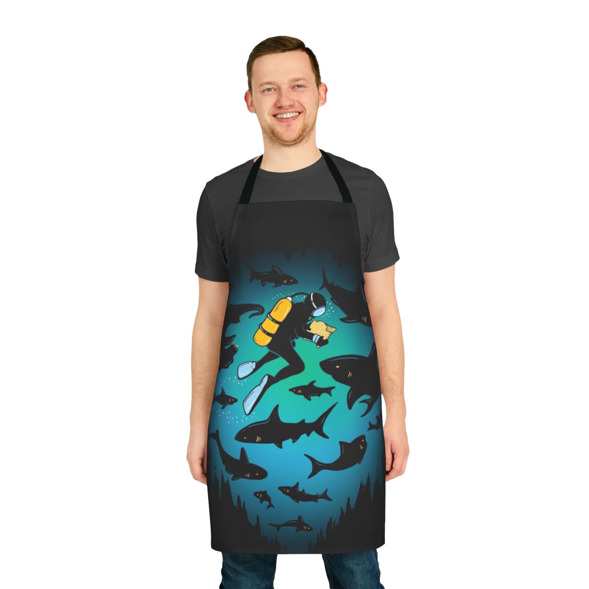 Colorful apron featuring an illustrated design of a shark and scuba diver underwater.