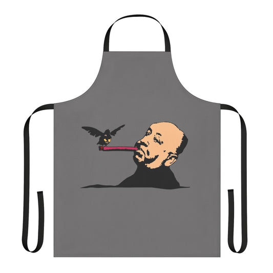 An Alfred Hitchcock-inspired apron featuring a bold bird and cigar graphic.