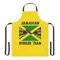 Jamaican Bobsled Team-inspired apron featuring the Jamaican flag colors and bobsled elements