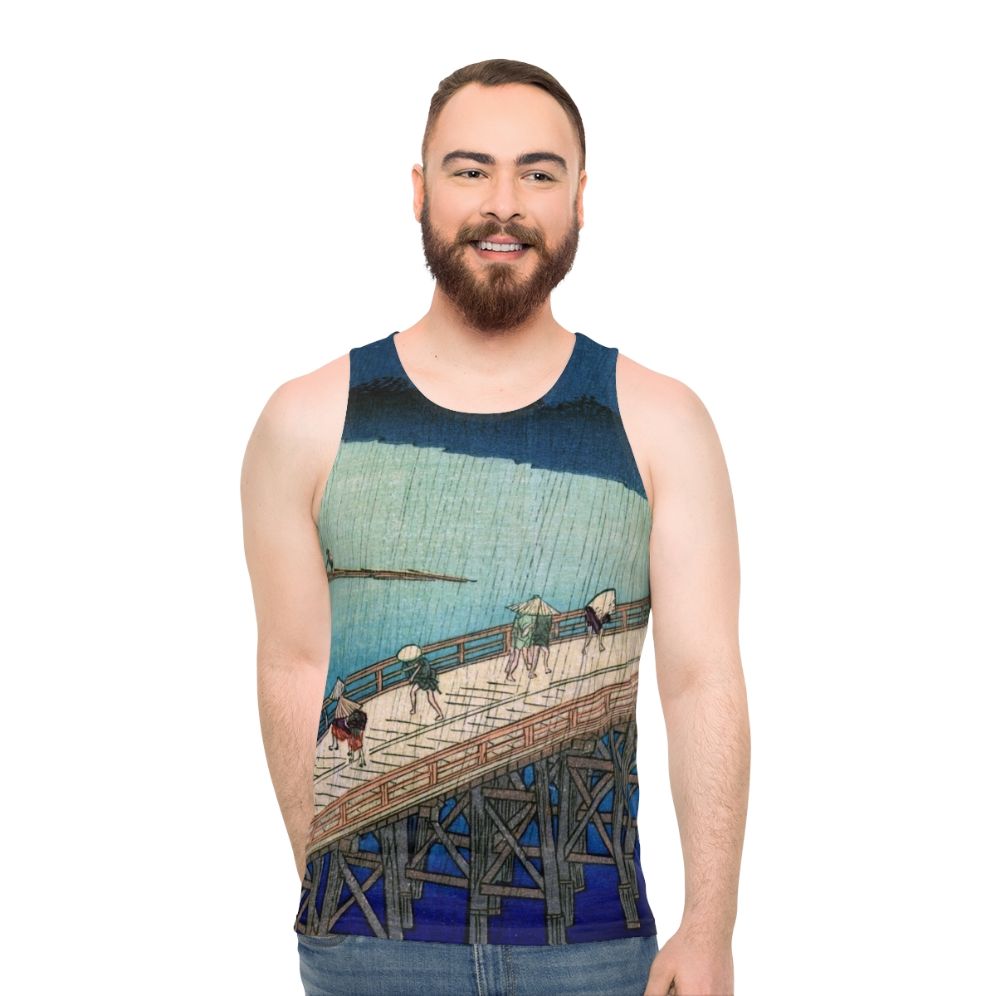 Unisex tank top featuring the Japanese ukiyo-e artwork "Sudden Shower Over Shin Ohashi Bridge" by Hiroshige