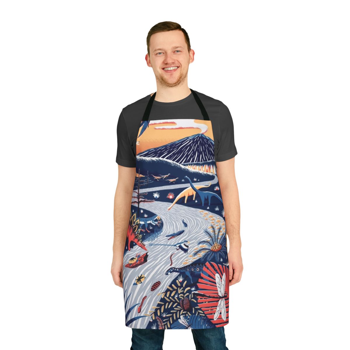A colorful kitchen apron featuring a late Jurassic era dinosaur and prehistoric animal design.