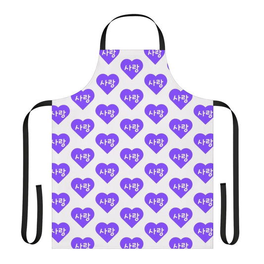 A purple apron with a heart design featuring the Korean hangul alphabet