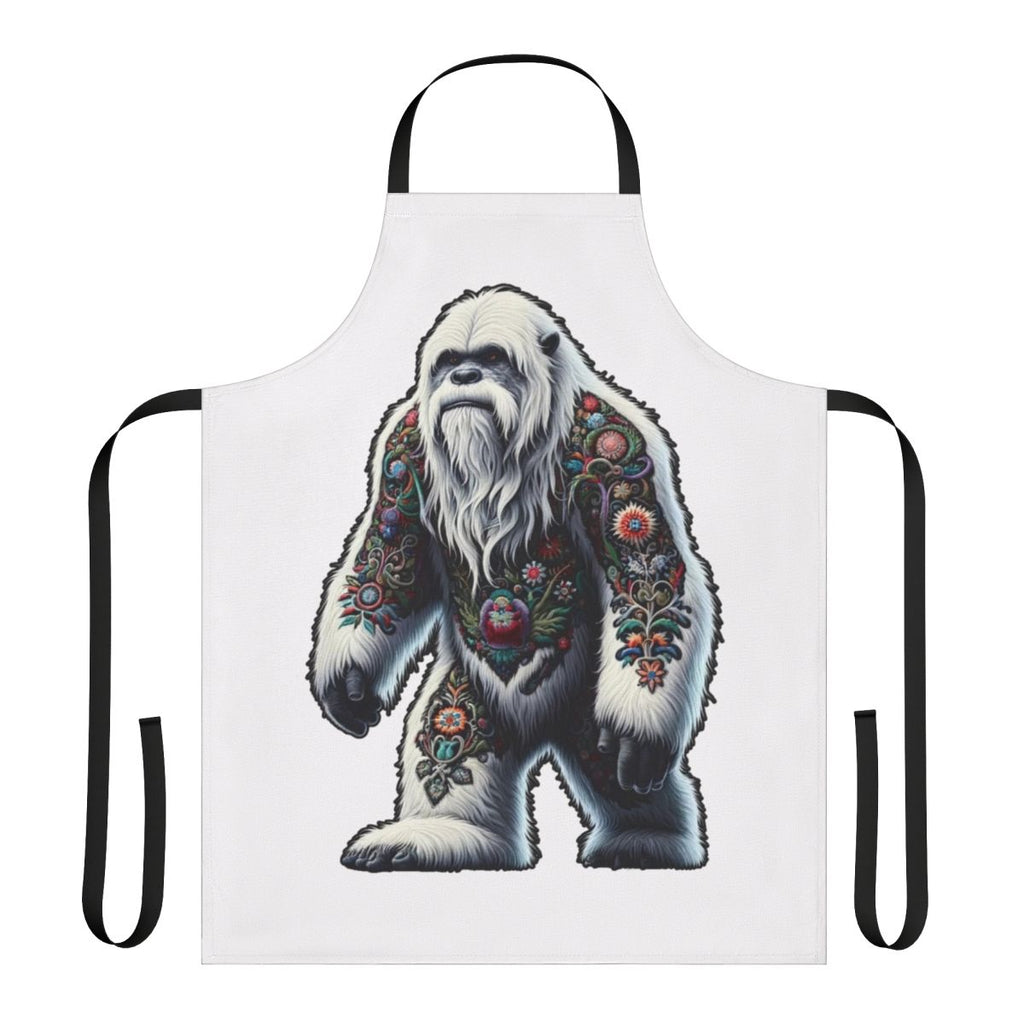 An apron featuring an embroidered design of the legendary yeti or bigfoot creature.