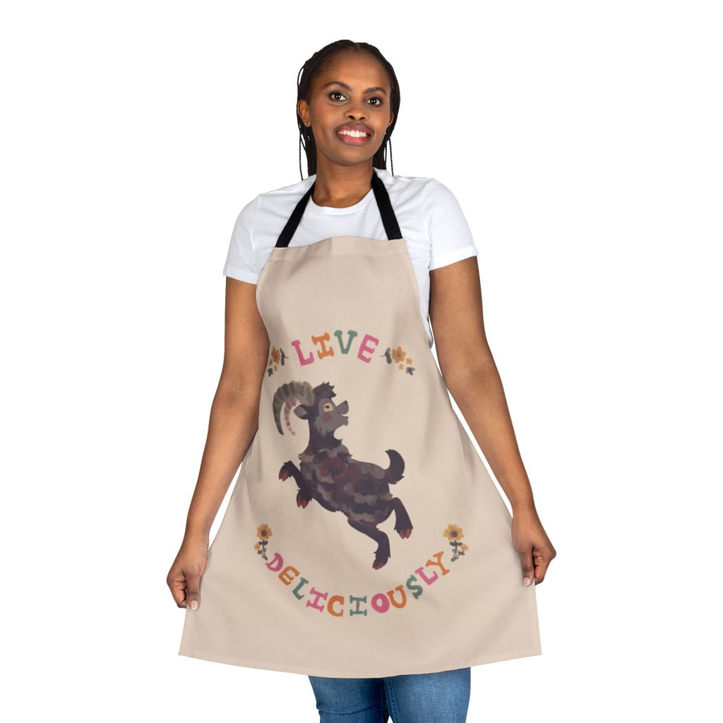 A witch-themed apron with a goat design, perfect for fall and Halloween cooking