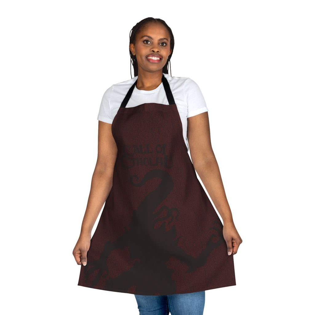 Apron featuring the text "The Horror Between The Lines Nyarlathotep" on a dark background, inspired by H.P. Lovecraft's Cthulhu Mythos.