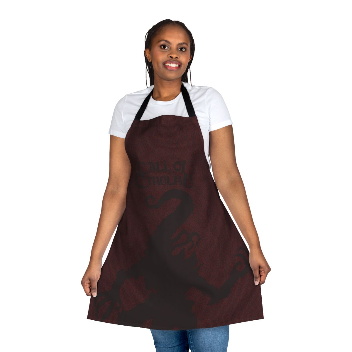 Apron featuring the text "The Horror Between The Lines Nyarlathotep" on a dark background, inspired by H.P. Lovecraft's Cthulhu Mythos.