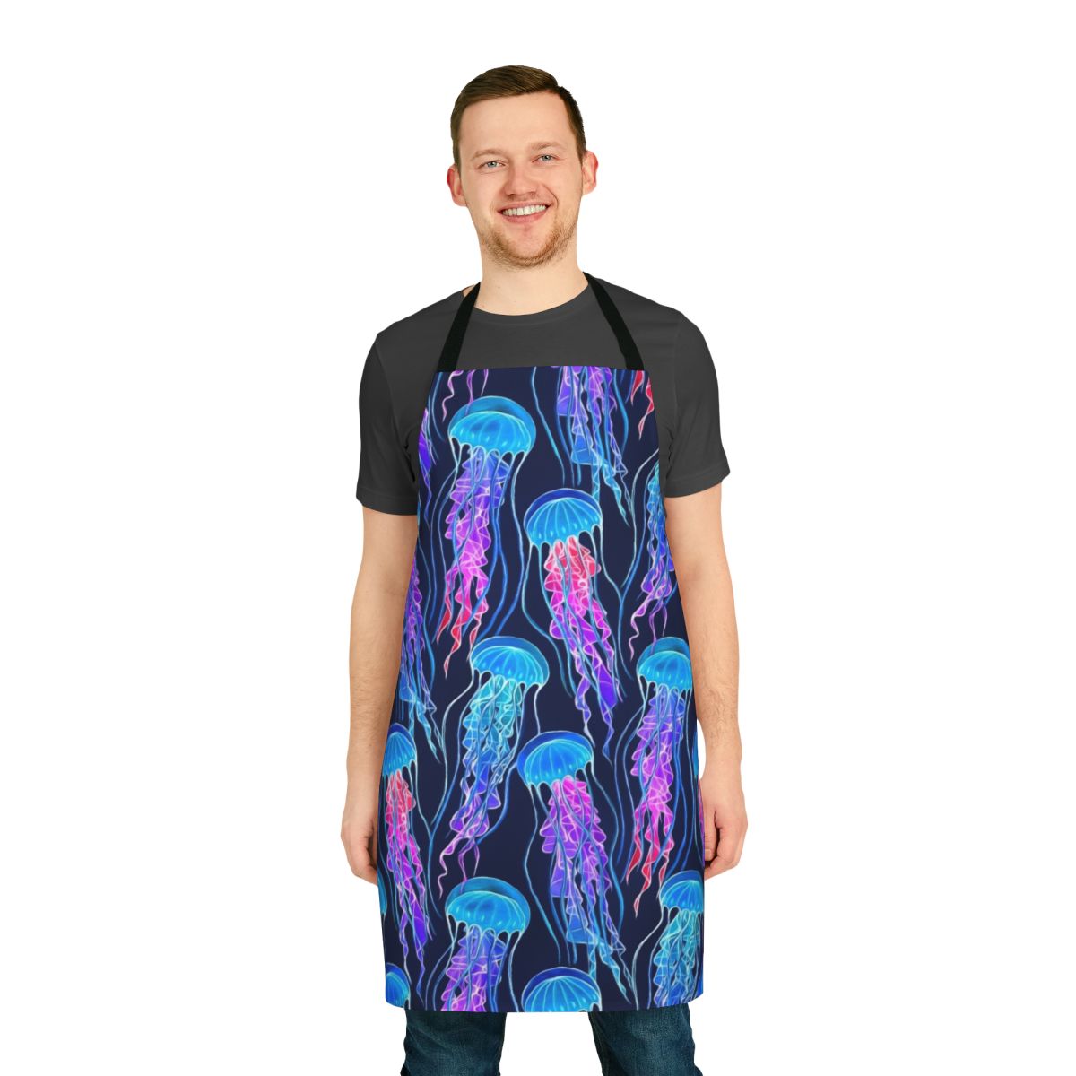 Luminescent jellyfish swimming in an ombre pattern on a navy blue apron
