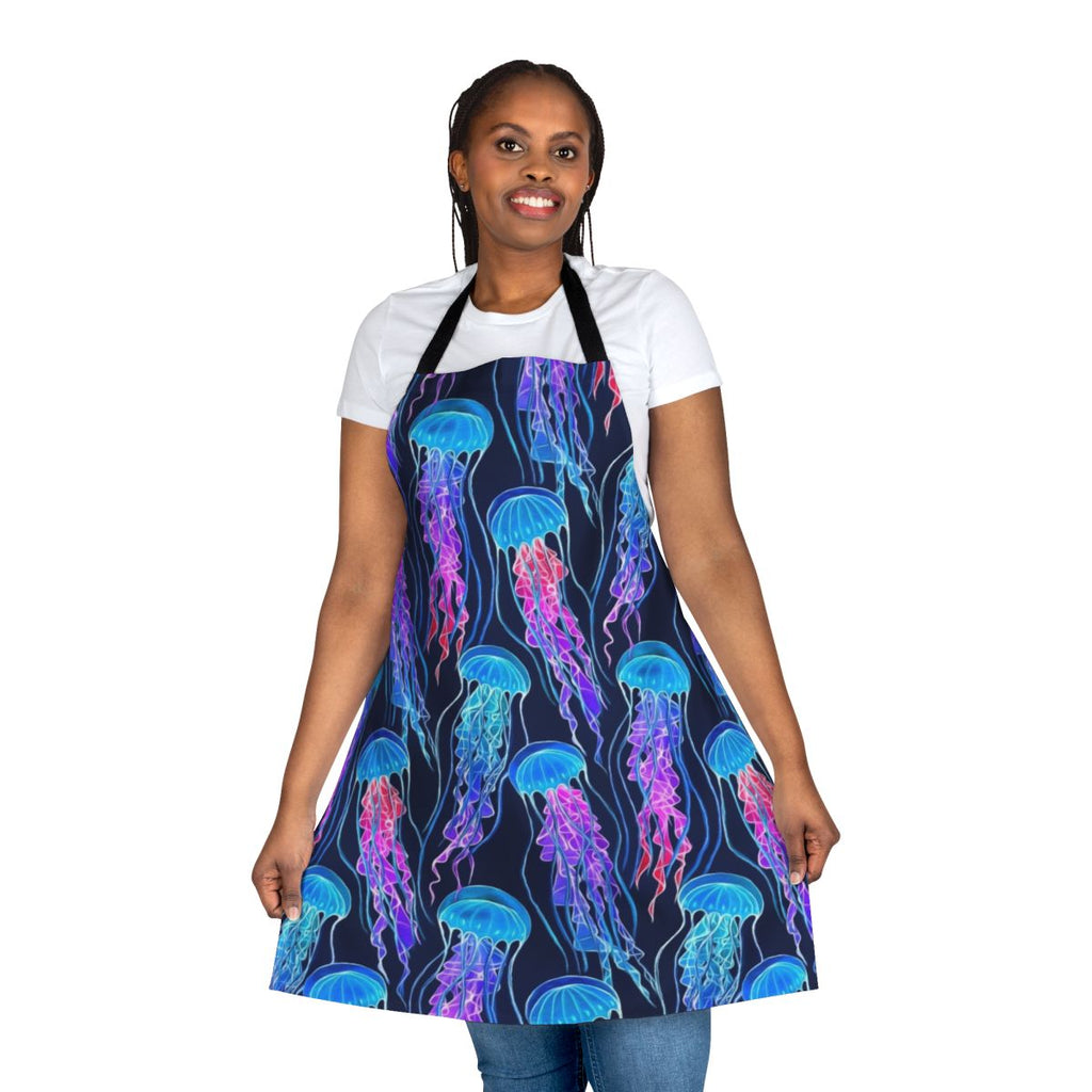 Luminescent jellyfish swimming in an ombre pattern on a navy blue apron
