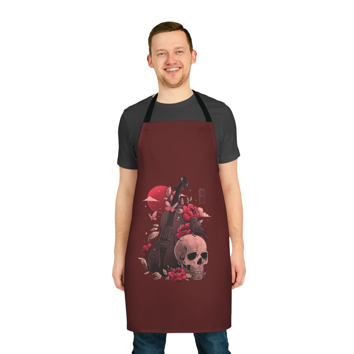 Artistic apron featuring a cello skull design in a gothic style
