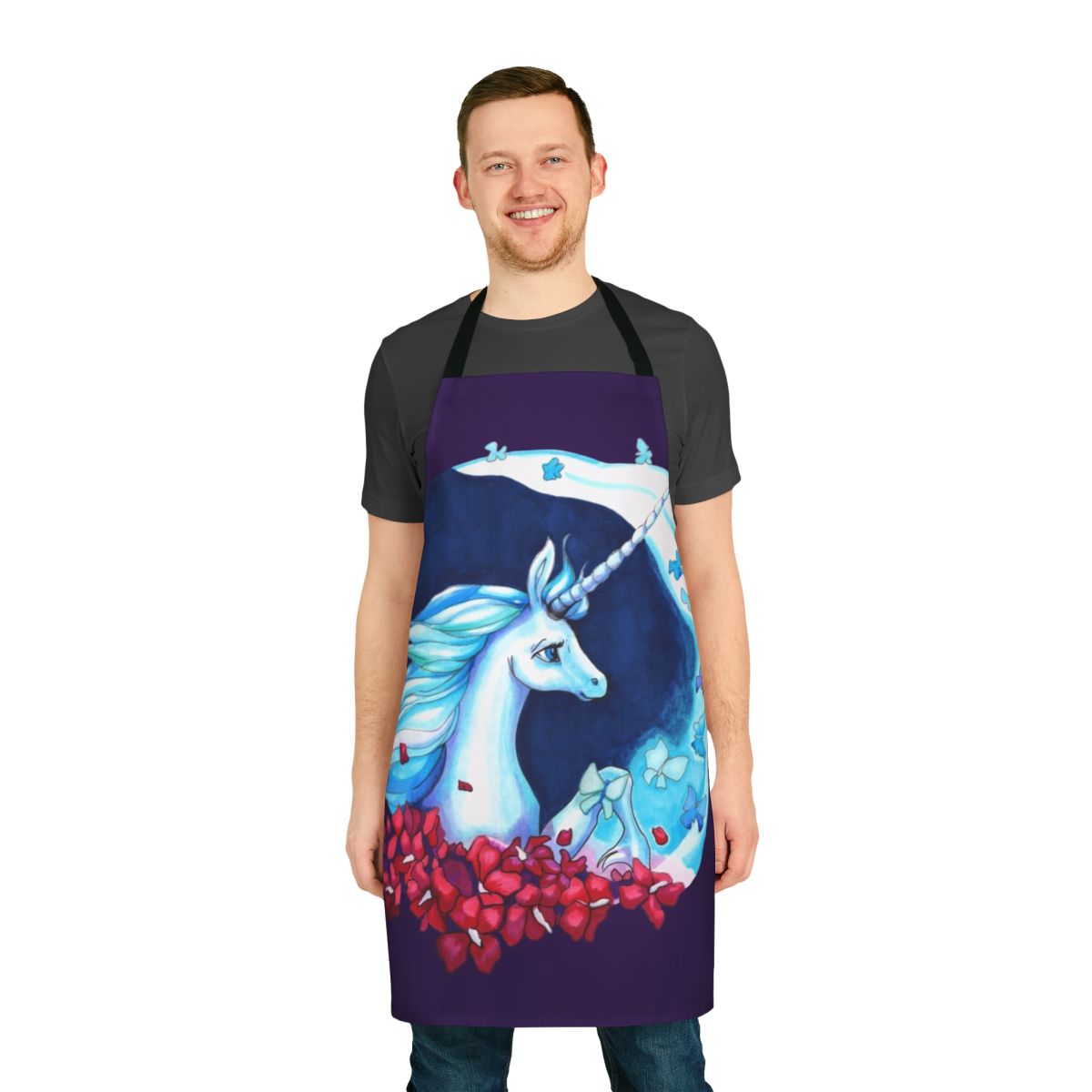 Whimsical apron featuring a unicorn silhouetted against a starry night sky with butterflies and blooming flowers