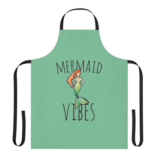 A colorful apron featuring a mermaid design, perfect for cooking, baking, or gardening.