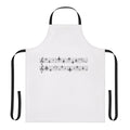 Minimalist apron with a simple music staff design and aviation elements including planes, wings, and flight instruments.