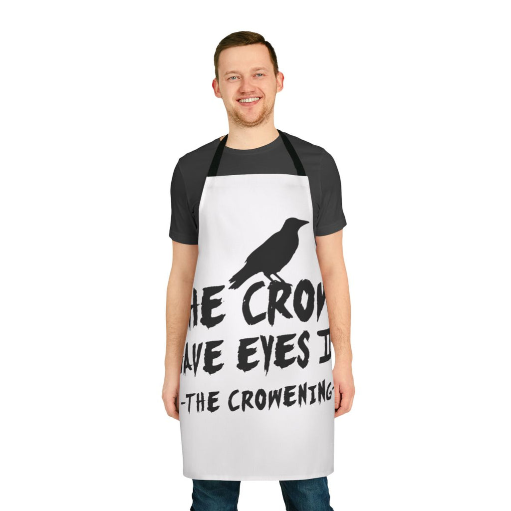 A black and white minimalist apron with a crow-themed design, inspired by the television show Schitt's Creek.