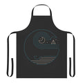 A minimalist apron design featuring a whale, moon, and boat silhouettes on a blue background