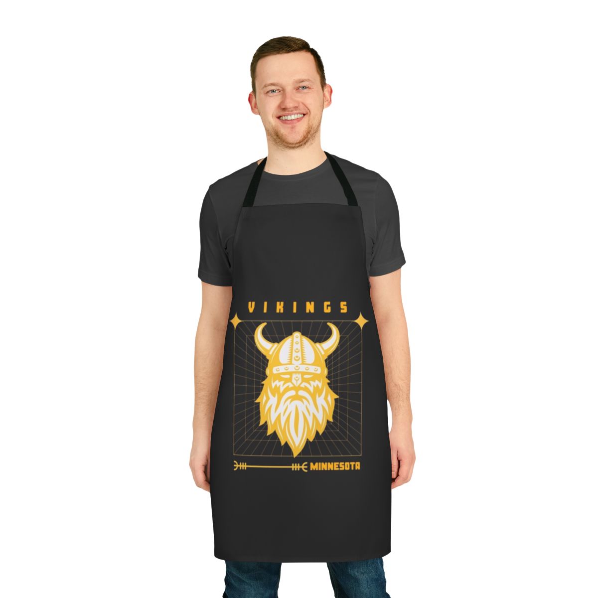 A navy blue kitchen apron featuring the Minnesota Vikings logo and team colors.