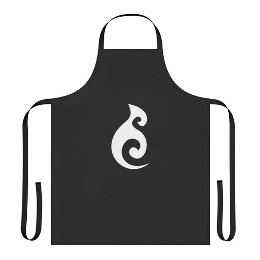 Moana-inspired kitchen apron featuring a Maori symbol design in black and white patterns.