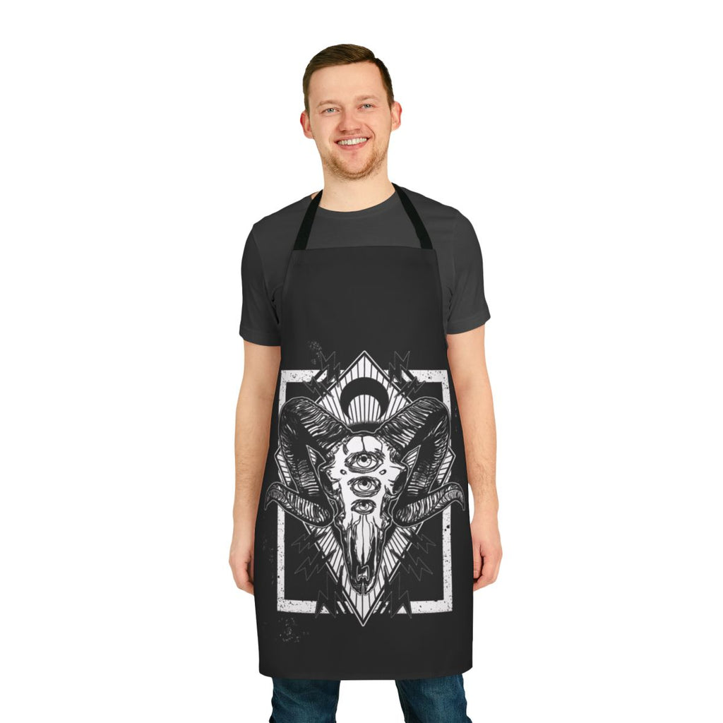 A black and white apron featuring a digital illustration of a ram skull.