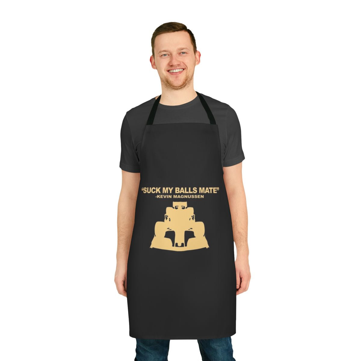 Motorsports enthusiast wearing an apron with "Suck My Balls Mate" text