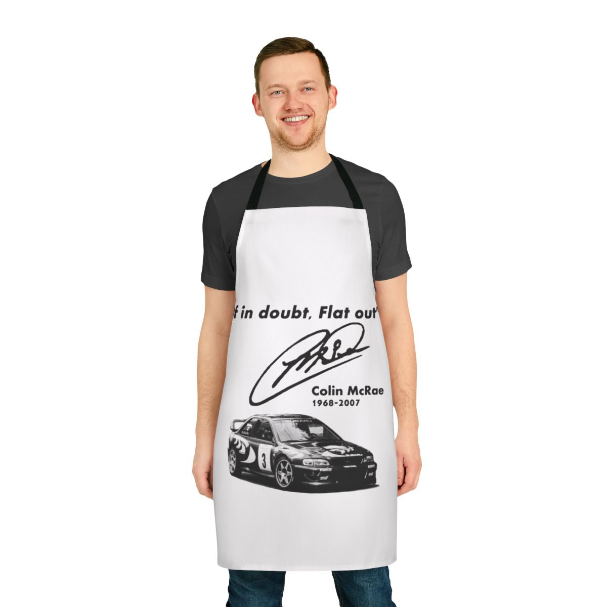Subaru-themed apron with "If in Doubt, Flat Out" design