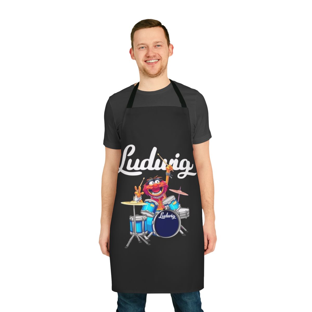 An apron featuring the muppet character Animal playing Ludwig drums
