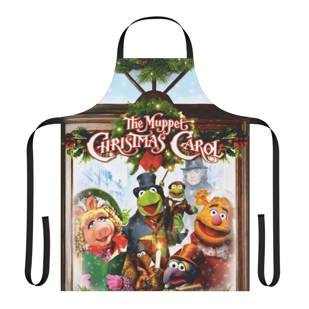 A red apron featuring characters from the Muppet Christmas Carol movie, including Kermit the Frog and Miss Piggy.