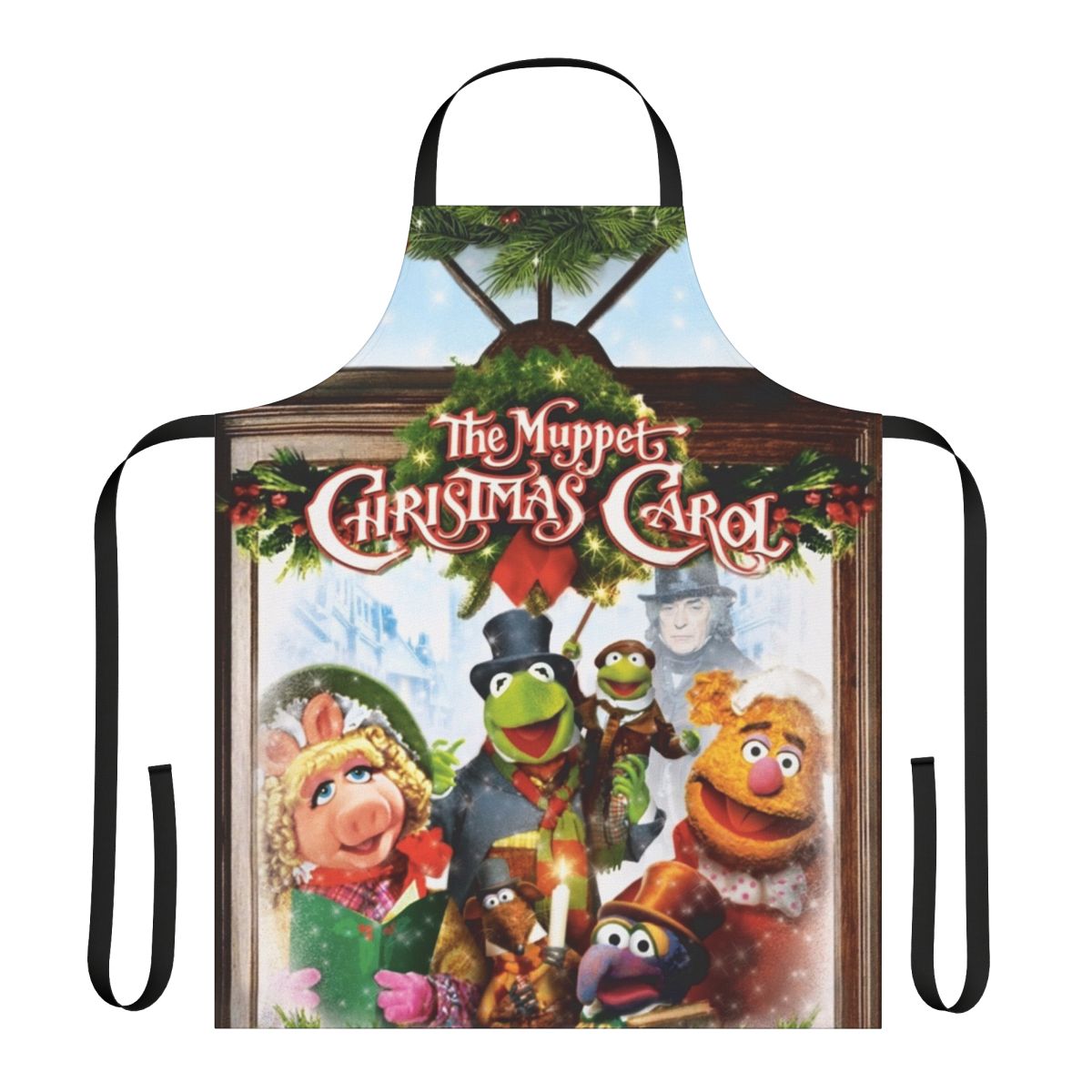 A red apron featuring characters from the Muppet Christmas Carol movie, including Kermit the Frog and Miss Piggy.