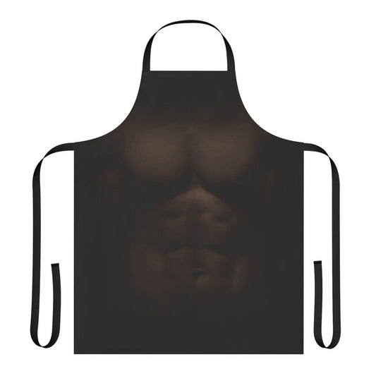 Muscular, shirtless man wearing an apron