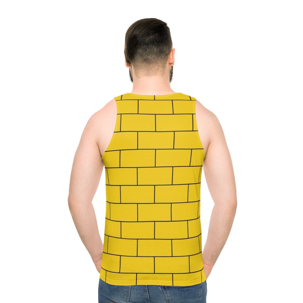 Mustard yellow unisex tank top with brick pattern graphic