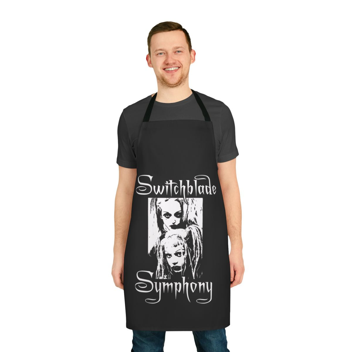A dark and mysterious apron with a Switchblade Symphony band logo, perfect for fans of gothic fashion and 80s post-punk music.