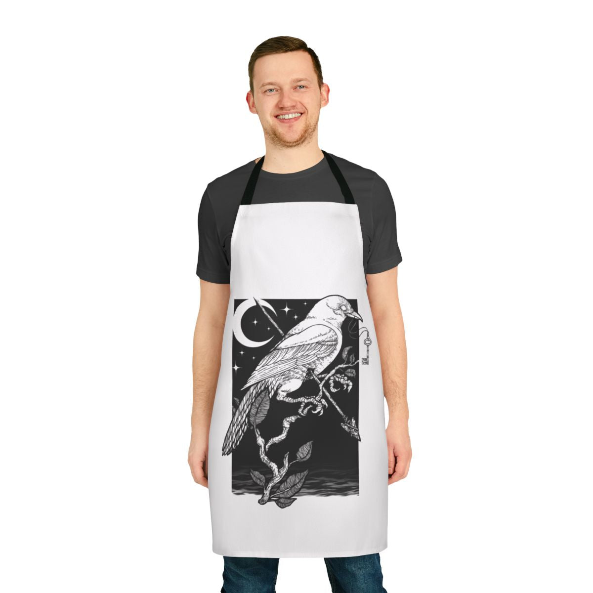 Striking black and white apron featuring a captivating night crow design