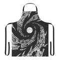 Apron with a design featuring a dark night sky, a moon, and silhouetted trees.