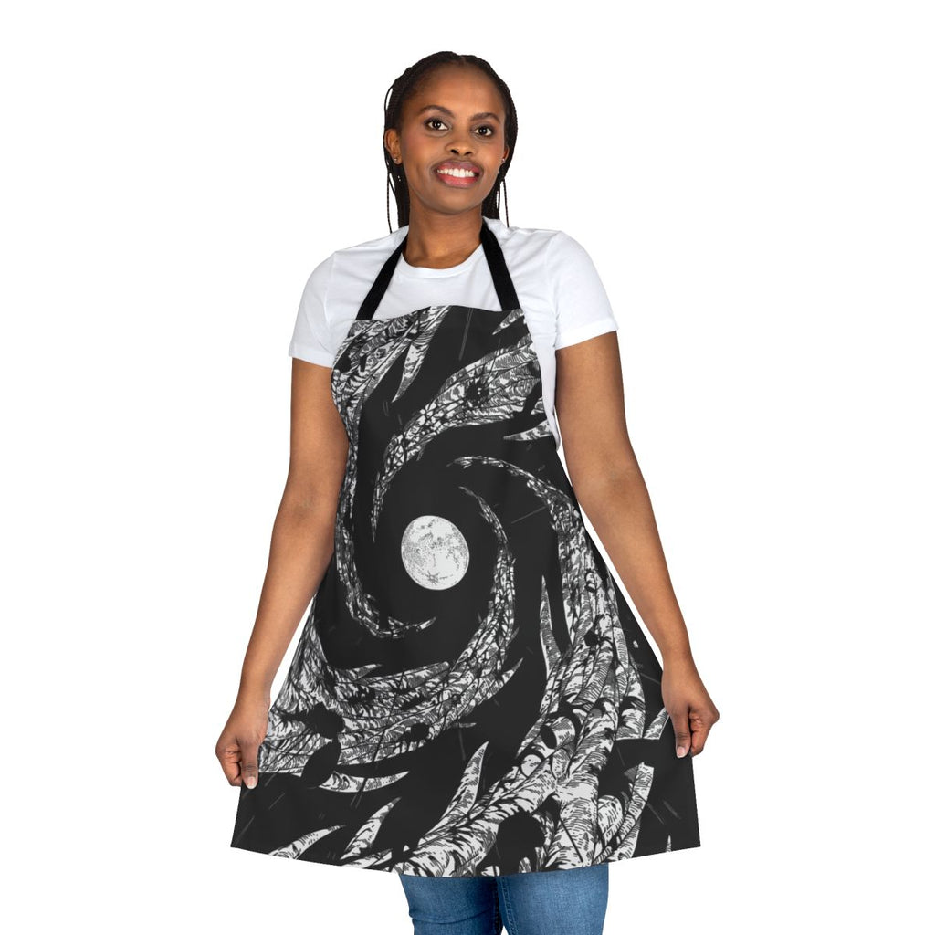 Apron with a design featuring a dark night sky, a moon, and silhouetted trees.