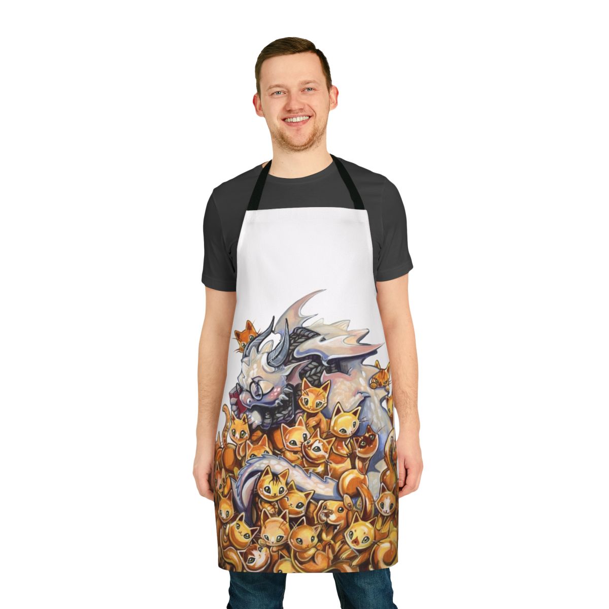 An apron with a dragon design hoarding a pile of golden kittens