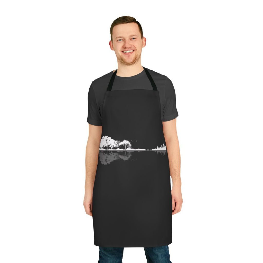Minimalist apron featuring a black tree silhouette design on a white background