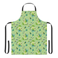 A green apron with a botanical Korok pattern, perfect for Zelda fans.