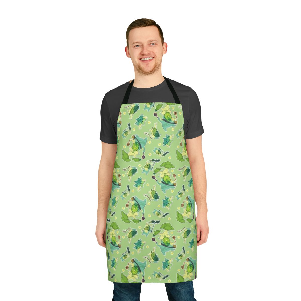 A green apron with a botanical Korok pattern, perfect for Zelda fans.