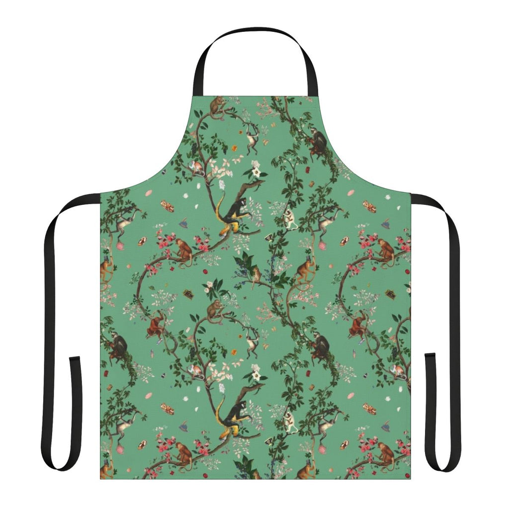 Lively and vibrant green apron featuring a monkey-themed floral design, perfect for the eco-conscious kitchen.